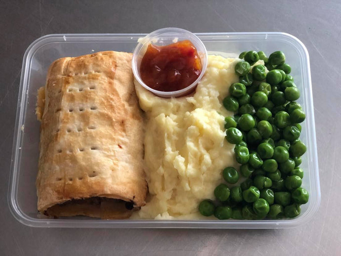 Home Made Sausage Roll With Creamy Mash, Peas & Chutney