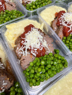 Meatloaf Topped With Napoli Sauce & Fresh Parmesan Served With Mash & Peas